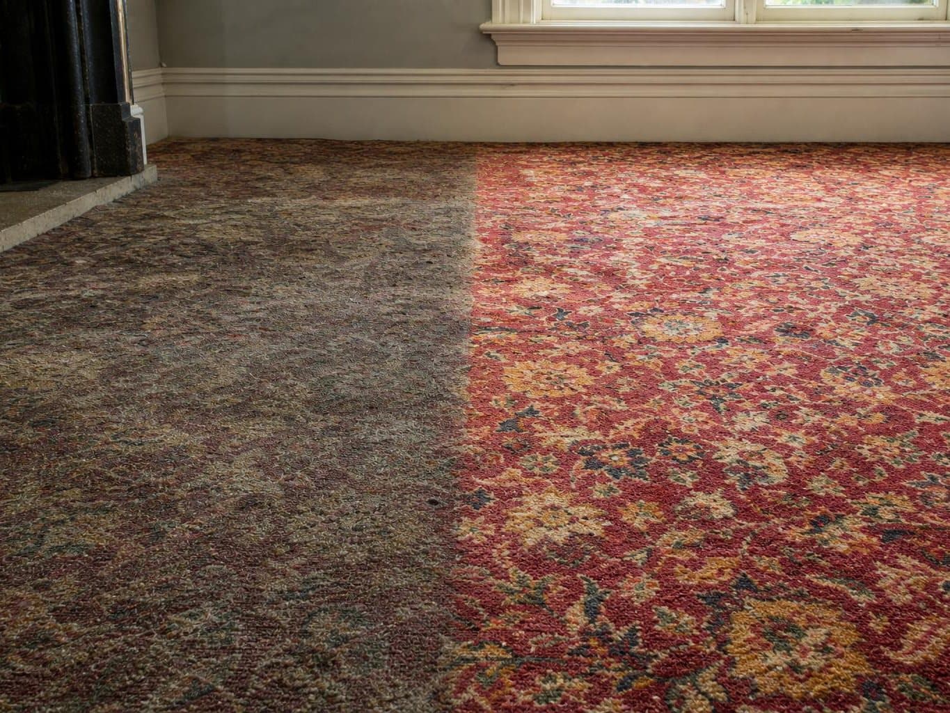 Patterned wool carpet in an old house, greyed on one side and with the pattern restored on the other